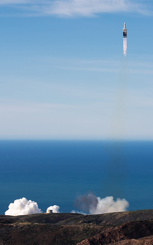 Delta IV Heavy rocket launching from Vandenberg.