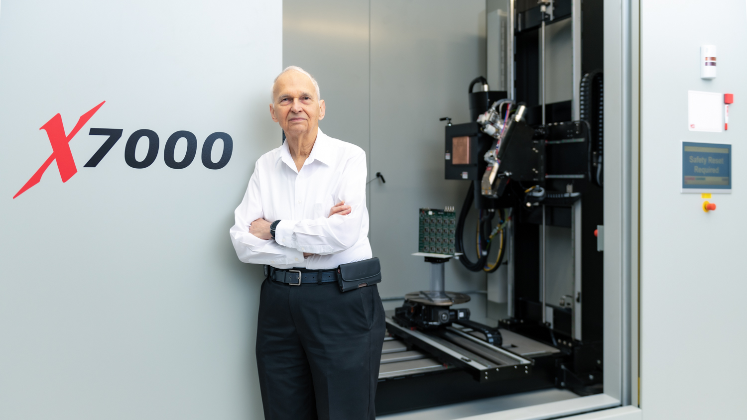 Scientist in front of new CT scanner