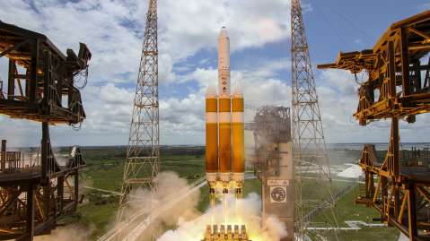 Picture of Delta 4 heavy rocket taking off from launch pad