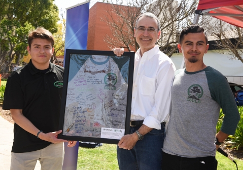 The MAES Chapter presents Steve with a signed and framed T-shirt as a token of their tremendous appreciation for his participation in the STEM Immersion Day at Cal State Long Beach.