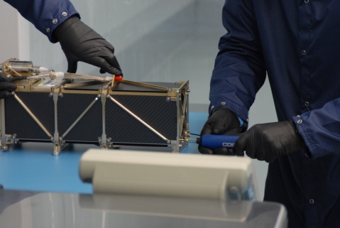 R3 being encapsulated at Rocket Lab's Huntington Beach, Calif. facility.