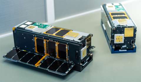 An image of the AeroCube-14 CubeSats prior to launch integration.