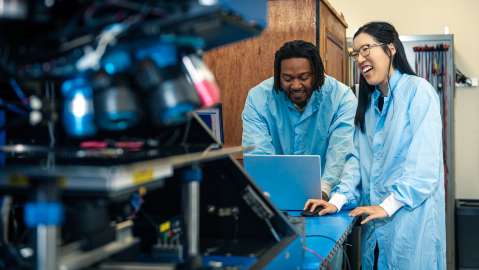 Lab with two people working