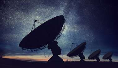 AdobeStock_173668395, Silhouettes of satellite dishes or radio antennas against night sky-4500x3000.jpg
