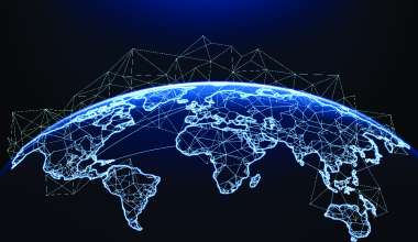 A graphic of the world interconnected, viewed from space.