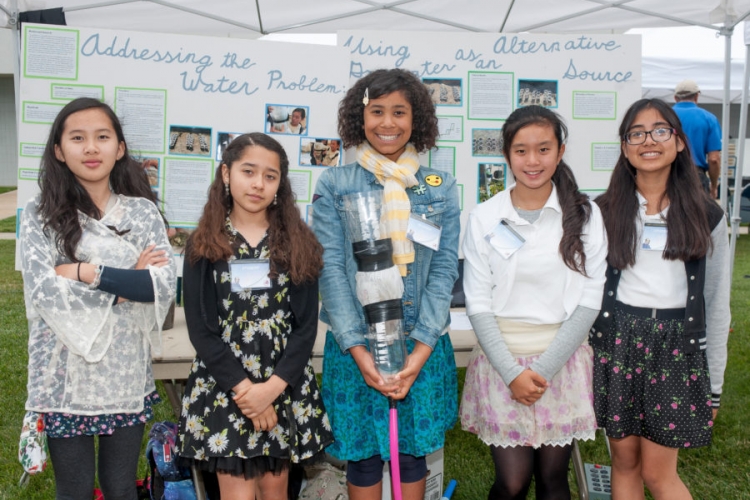 Students with their project at the science fair