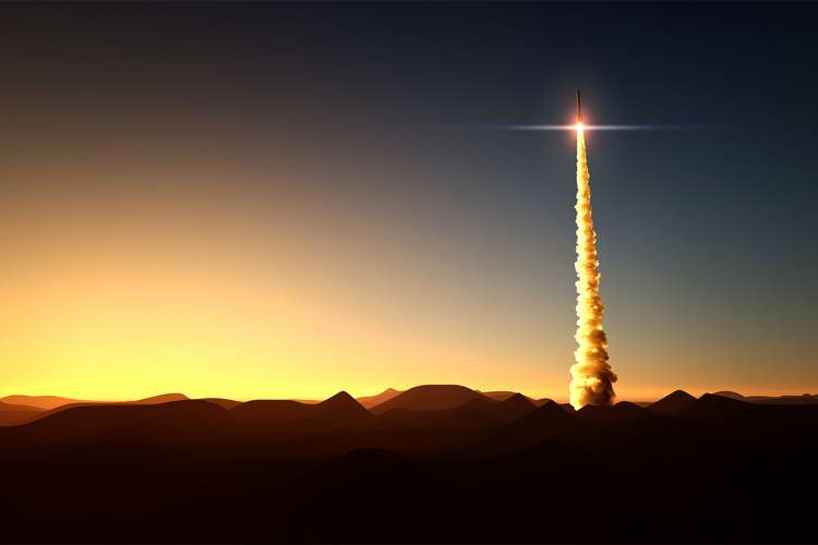 Rocket launch at sunset