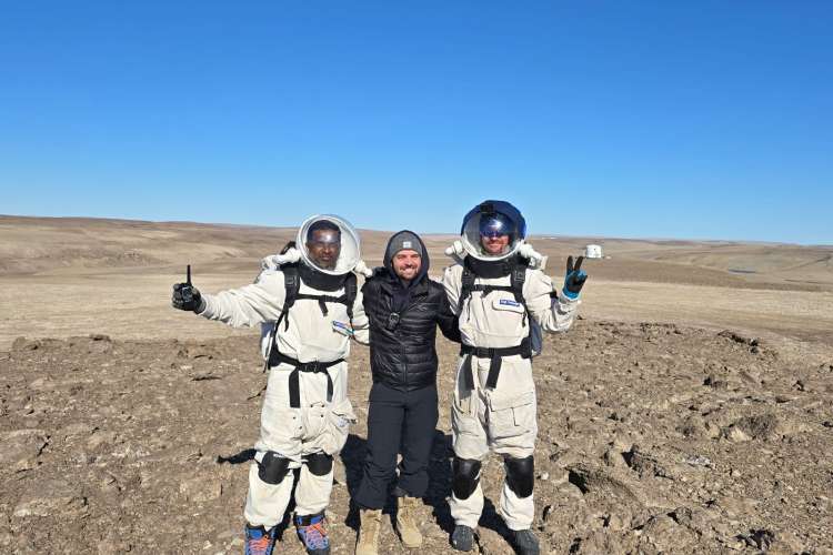 Trevor Jahn and mission participants on site