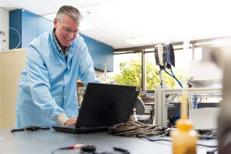 Dan Mabry tests software for the mobile visible beacon prior to delivery.