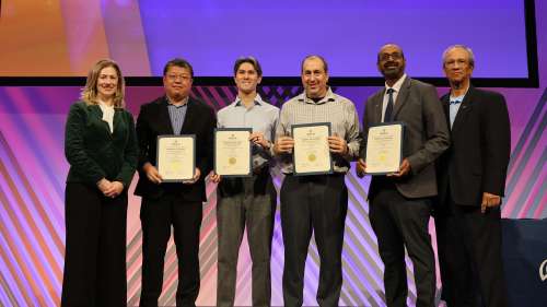 From left: AIAA Fellow Lesley Weitz, Aerospace’s Kevin Qu, Leland Shimizu, Jacob Rome, Vinay Goyal (AIAA Fellow) and AIAA President/Aerospace Board Member Daniel Hastings. [Credit: AIAA]