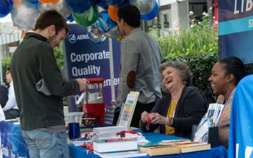 Aerospace employees at the fair